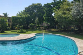 Secure, Gated Oasis close to City
